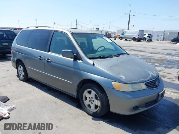 2001 Honda Odyssey EX z VIN 2HKRL18641H504729, wystawiony jako IAAI lot #42337944 z przebiegiem 203 356 mil mil oraz . Historia ofert i sprzedaży dostępna na DreamBid. Obrazek 1.