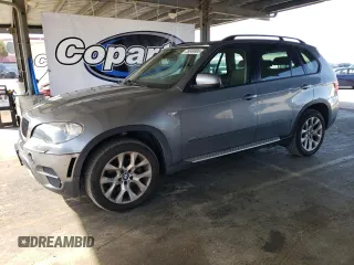 2011 BMW X5 35i z VIN 5UXZV4C5XBL410649, wystawiony jako Copart lot #55049895 z przebiegiem 103 299 mil mil oraz Czysty tytuł • Clean title. Historia ofert i sprzedaży dostępna na DreamBid. Obrazek 1.