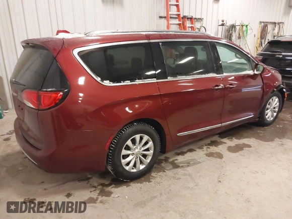 2018 Chrysler Pacifica Touring L Plus z VIN 2C4RC1EG5JR227511, wystawiony jako IAAI lot #41344075 z przebiegiem 86 860 mil mil oraz . Historia ofert i sprzedaży dostępna na DreamBid. Obrazek 4.