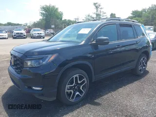 2023 Honda Passport Elite with VIN 5FNYF8H01PB030270, listed as a IAAI auction lot 42667744 with 7,931 mi miles and . Bid and sale history available at DreamBid. Image 17.