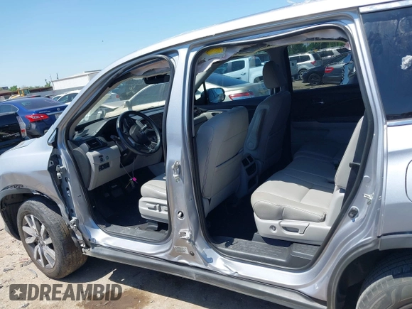 2019 Honda Pilot EX-L with VIN 5FNYF5H58KB040331, listed as a IAAI auction lot 41977727 with 90,655 mi miles and . Bid and sale history available at DreamBid. Image 14.