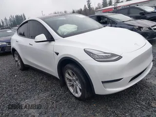 2022 Tesla Model Y Long Range z VIN 7SAYGDEE6NF451259, wystawiony jako IAAI lot #41200775 z przebiegiem 59 683 mil mil oraz . Historia ofert i sprzedaży dostępna na DreamBid. Obrazek 1.