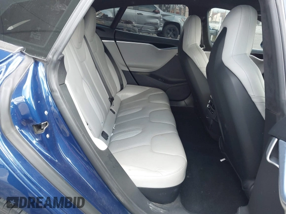 2016 Tesla Model S 90D with VIN 5YJSA1E22GF154873, listed as a IAAI auction lot 41950274 with 82,649 mi miles and . Bid and sale history available at DreamBid. Image 8.