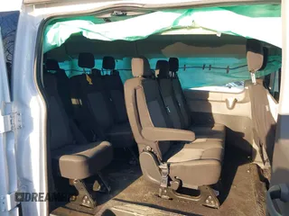 2021 Ford Transit Passenger XL with VIN 1FBAX2Y87MKA64167, listed as a IAAI auction lot 41087474 with 67,242 mi miles and . Bid and sale history available at DreamBid. Image 8.