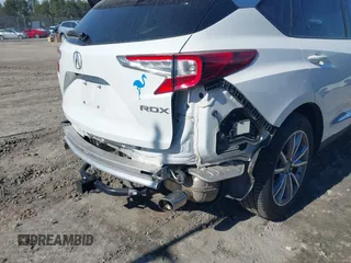 2020 Acura RDX Technology with VIN 5J8TC1H52LL006185, listed as a IAAI auction lot 41457828 with 59,998 mi miles and . Bid and sale history available at DreamBid. Image 18.