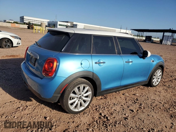 2015 MINI Hardtop 4 Door with VIN WMWXS5C54FT827341, listed as a Copart auction lot 63872395 with 83,023 mi miles and Salvage title. Bid and sale history available at DreamBid. Image 3.