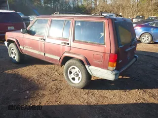 2001 Jeep Cherokee Sport with VIN 1J4FT48S11L539624, listed as a IAAI auction lot 41370117 with 120,052 mi miles. Bid and sale history available at carsss.com. Image 3.