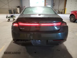 2015 Lincoln MKZ z VIN 3LN6L2J95FR613519, wystawiony jako Copart lot #59165895 z przebiegiem 117 630 mil mil oraz Szkoda całkowita • Salvage title. Historia ofert i sprzedaży dostępna na DreamBid. Obrazek 6.