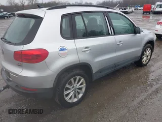 2017 Volkswagen Tiguan S with VIN WVGBV7AX4HK051172, listed as a IAAI auction lot 41843182 with 160,010 mi miles and . Bid and sale history available at DreamBid. Image 4.