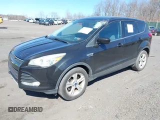 2015 Ford Escape SE with VIN 1FMCU9GX2FUB68101, listed as a IAAI auction lot 41902379 with 136,248 mi miles. Bid and sale history available at carsss.com. Image 2.