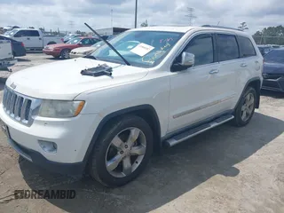 2012 Jeep Grand Cherokee Overland with VIN 1C4RJECT8CC195064, listed as a IAAI auction lot 41860187 with 241,367 mi miles. Bid and sale history available at carsss.com. Image 17.