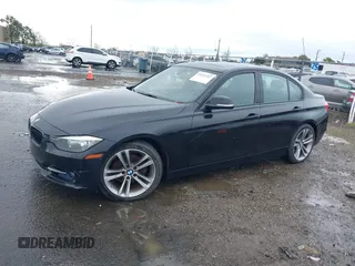 2013 BMW 3 Series 328i with VIN WBA3C1G52DNN93443, listed as a IAAI auction lot 41511247 with 121,254 mi miles and . Bid and sale history available at DreamBid. Image 2.