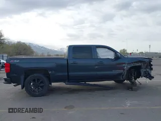 2017 Chevrolet Silverado 1500 LT with VIN 3GCUKREC7HG220780, listed as a IAAI auction lot 41978463 with 131,532 mi miles and . Bid and sale history available at DreamBid. Image 13.