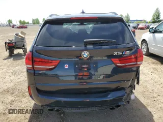 2017 BMW X5 M z VIN 5YMKT6C38H0X20710, wystawiony jako Copart lot #56927285 z przebiegiem 81 524 mil mil oraz Szkody całkowita. Historia ofert i sprzedaży dostępna na DreamBid. Obrazek 6.