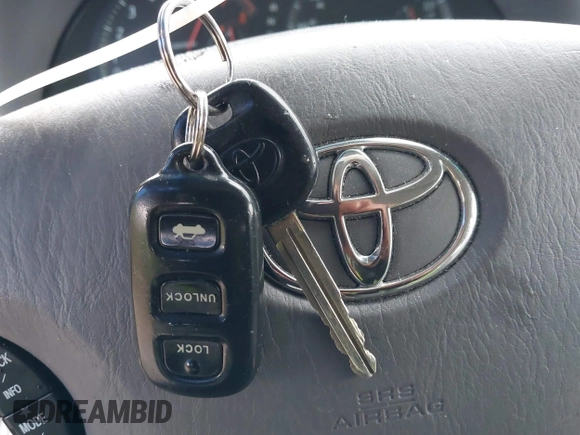 2002 Toyota Camry XLE z VIN JTDBF30K420083381, wystawiony jako IAAI lot #42368073 z przebiegiem 148 746 mil mil oraz . Historia ofert i sprzedaży dostępna na DreamBid. Obrazek 11.