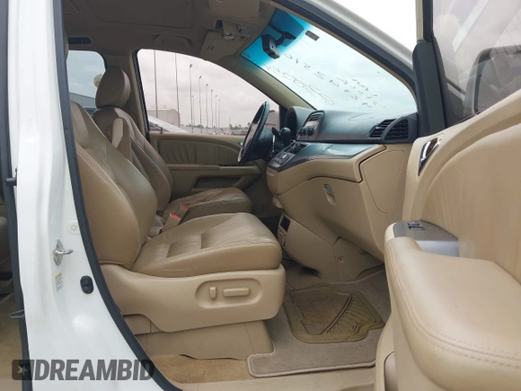 2010 Honda Odyssey EX-L z VIN 5FNRL3H78AB030254, wystawiony jako IAAI lot #42742510 z przebiegiem 277 913 mil mil oraz . Historia ofert i sprzedaży dostępna na DreamBid. Obrazek 5.