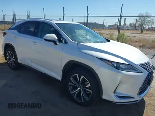 2022 Lexus RX 450h with VIN 2T2HGMDA5NC088416, listed as a IAAI auction lot 42587808 with 34,723 mi miles and . Bid and sale history available at DreamBid. Image 1.