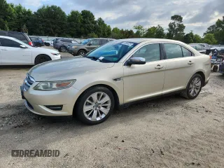 2010 Ford Taurus Limited with VIN 1FAHP2FW7AG138753, listed as a Copart auction lot 64880025 with 242,728 mi miles and Clean title. Bid and sale history available at DreamBid. Image 1.