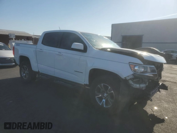 2017 Chevrolet Colorado 4WD Z71 with VIN 1GCGTDEN9H1180800, listed as a Copart auction lot 60430985 with 104,930 mi miles and Salvage title. Bid and sale history available at DreamBid. Image 4.