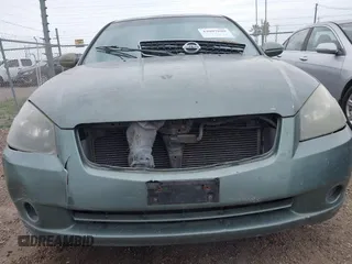 2006 Nissan Altima 2.5 with VIN 1N4AL11D46N325738, listed as a IAAI auction lot 42097809 with 299,243 mi miles. Bid and sale history available at carsss.com. Image 6.