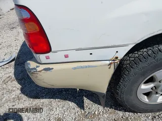 2000 Toyota Land Cruiser z VIN JT3HT05J5Y0126396, wystawiony jako IAAI lot #41986185 z przebiegiem 201 156 mil mil oraz . Historia ofert i sprzedaży dostępna na DreamBid. Obrazek 18.