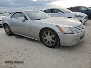 2004 Cadillac XLR z VIN 1G6YV34A045603308, wystawiony jako Copart lot #75459524 z przebiegiem Nie podano mil oraz Szkody całkowita. Historia ofert i sprzedaży dostępna na DreamBid. Obrazek 4.