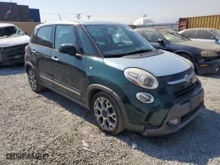 2014 FIAT 500L Trekking with VIN ZFBCFADH4EZ010196, listed as a Copart auction lot 62566094 with 128,519 mi miles and Salvage Title. Bid and sale history available at carsss.com. Image 4.