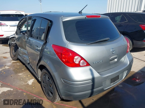 2009 Nissan Versa 1.8 SL with VIN 3N1BC13E19L372298, listed as a IAAI auction lot 42011338 with 131,882 mi miles. Bid and sale history available at carsss.com. Image 3.