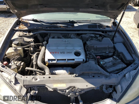 2003 Toyota Camry LE z VIN 4T1BF32K93U566965, wystawiony jako Copart lot #71979144 z przebiegiem 267 228 mil mil oraz Szkoda całkowita • Salvage title. Historia ofert i sprzedaży dostępna na DreamBid. Obrazek 11.