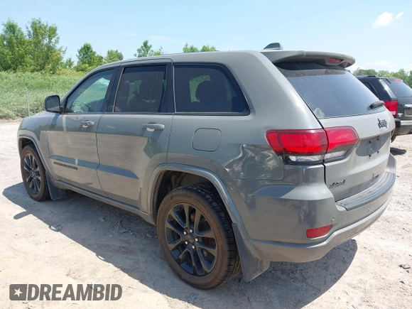 2020 Jeep Grand Cherokee Laredo E with VIN 1C4RJFAG0LC293050, listed as a IAAI auction lot 42566345 with 64,960 mi miles and . Bid and sale history available at DreamBid. Image 3.
