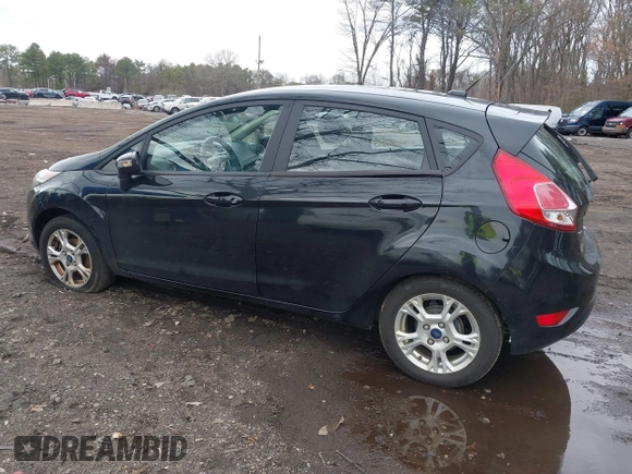 2015 Ford Fiesta SE with VIN 3FADP4EJ9FM175123, listed as a IAAI auction lot 41948452 with 130,801 mi miles. Bid and sale history available at carsss.com. Image 3.