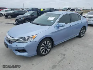 2017 Honda Accord Hybrid with VIN JHMCR6F32HC010979, listed as a IAAI auction lot 41359613 with 29,823 mi miles. Bid and sale history available at carsss.com. Image 2.