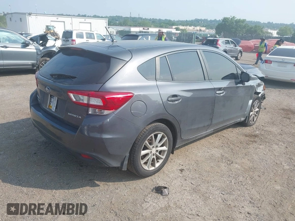 2018 Subaru Impreza with VIN 4S3GTAA63J3748319, listed as a IAAI auction lot 42441310 with 71,616 mi miles and . Bid and sale history available at DreamBid. Image 4.