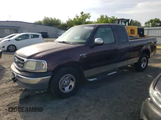2000 Ford F-150 with VIN 1FTRX17W5YKA50203, listed as a Copart auction lot 54734615 with Not Provided miles and Salvage Title. Bid and sale history available at DreamBid. Image 1.