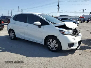 2015 Honda Fit LX with VIN 3HGGK5G55FM747740, listed as a Copart auction lot 61692725 with 61,923 mi miles and Salvage title. Bid and sale history available at DreamBid. Image 4.