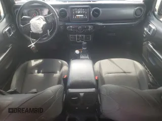 2021 Jeep Wrangler Unlimited Willys with VIN 1C4HJXDN0MW859686, listed as a Copart auction lot 56657725 with 49,984 mi miles and Salvage title. Bid and sale history available at DreamBid. Image 8.
