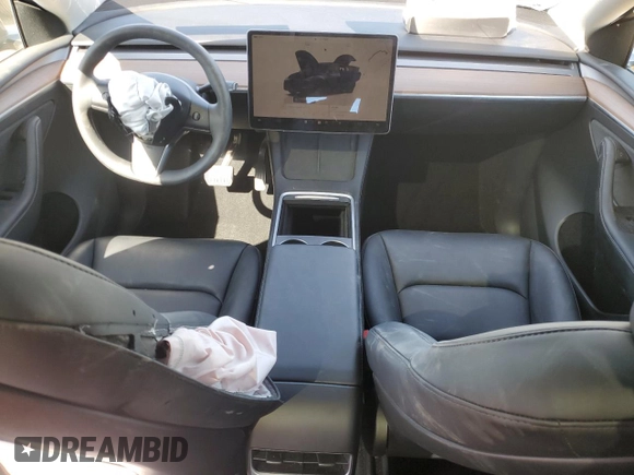 2024 Tesla Model Y with VIN 7SAYGDED0RF125308, listed as a Copart auction lot 61614675 with 11,608 mi miles and Salvage title. Bid and sale history available at DreamBid. Image 8.