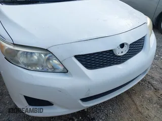 2010 Toyota Corolla with VIN 2T1BU4EE1AC312151, listed as a IAAI auction lot 42761709 with 121,356 mi miles and . Bid and sale history available at DreamBid. Image 15.