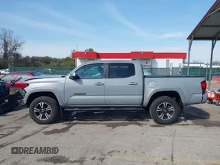 2018 Toyota Tacoma SR with VIN 3TMCZ5AN6JM170128, listed as a IAAI auction lot 42038979 with 59,497 mi miles. Bid and sale history available at carsss.com. Image 14.