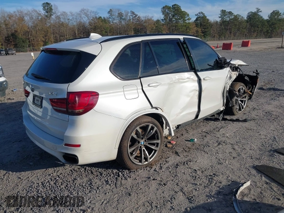 2015 BMW X5 xDrive50i z VIN 5UXKR6C58F0J78013, wystawiony jako IAAI lot #41335257 z przebiegiem Nie podano mil oraz . Historia ofert i sprzedaży dostępna na DreamBid. Obrazek 4.