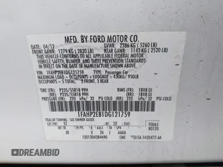 2013 Ford Taurus SEL with VIN 1FAHP2E81DG121759, listed as a IAAI auction lot 41939931 with 110,756 mi miles. Bid and sale history available at carsss.com. Image 9.