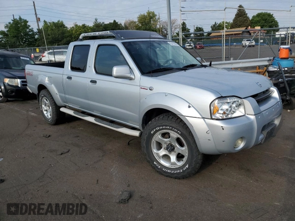 2002 Nissan Frontier SC z VIN 1N6MD29Y12C326737, wystawiony jako Copart lot #63475954 z przebiegiem 199 337 mil mil oraz Czysty tytuł • Clean title. Historia ofert i sprzedaży dostępna na DreamBid. Obrazek 4.