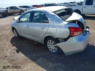 2009 Toyota Yaris with VIN JTDBT903491323280, listed as a IAAI auction lot 41770221 with 315,030 mi miles. Bid and sale history available at carsss.com. Image 3.
