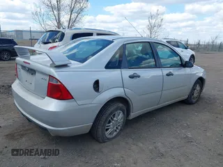 2006 Ford Focus S with VIN 1FAFP34N86W204778, listed as a IAAI auction lot 42128137 with 99,092 mi miles and . Bid and sale history available at carsss.com. Image 4.
