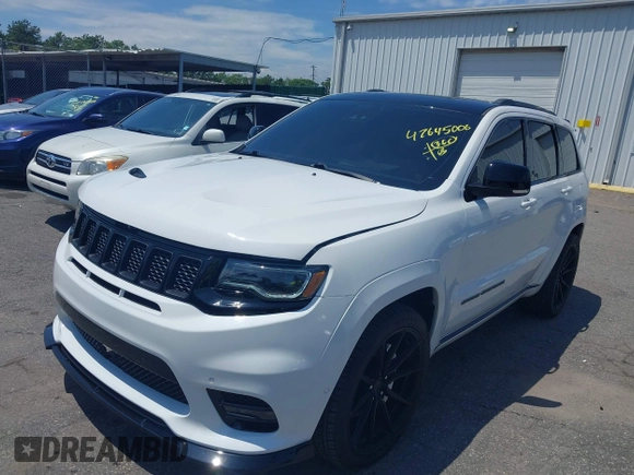 2019 Jeep Grand Cherokee Summit with VIN 1C4RJFJT1KC785744, listed as a IAAI auction lot 42645006 with 38,483 mi miles and . Bid and sale history available at DreamBid. Image 18.