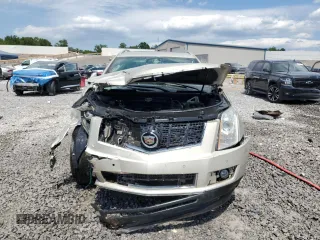 2015 Cadillac SRX Premium Collection with VIN 3GYFNDE30FS568976, listed as a Copart auction lot 57725515 with 67,622 mi miles and Salvage title. Bid and sale history available at DreamBid. Image 5.