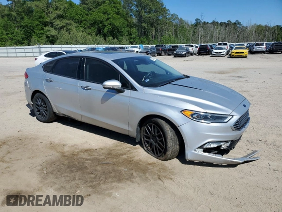 2017 Ford Fusion SE z VIN 3FA6P0HD7HR184691, wystawiony jako Copart lot #52515085 z przebiegiem 113 275 mil mil oraz Szkoda całkowita • Salvage title. Historia ofert i sprzedaży dostępna na DreamBid. Obrazek 4.