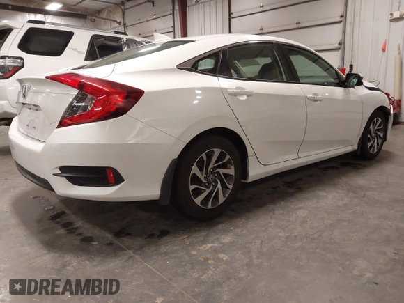 2018 Honda Civic EX with VIN 19XFC2F74JE005647, listed as a IAAI auction lot 41938607 with 90,263 mi miles and . Bid and sale history available at DreamBid. Image 4.