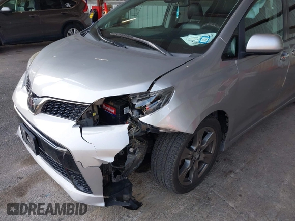 2018 Toyota Sienna SE with VIN 5TDXZ3DC0JS950481, listed as a IAAI auction lot 42404211 with 87,697 mi miles and . Bid and sale history available at DreamBid. Image 6.