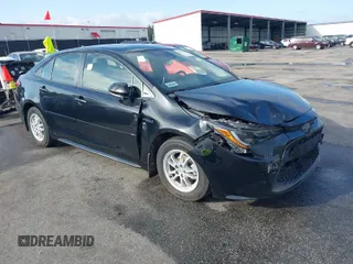 2021 Toyota Corolla Hybrid LE with VIN JTDEAMDE3MJ025426, listed as a IAAI auction lot 41922582 with 57,705 mi miles. Bid and sale history available at carsss.com. Image 1.